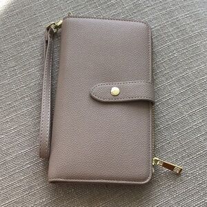 Leather travel wallet and passport holder with RFID stop.